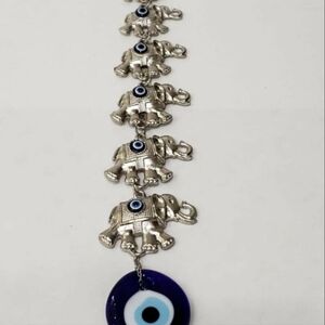 Evil eye elephant wall hanging